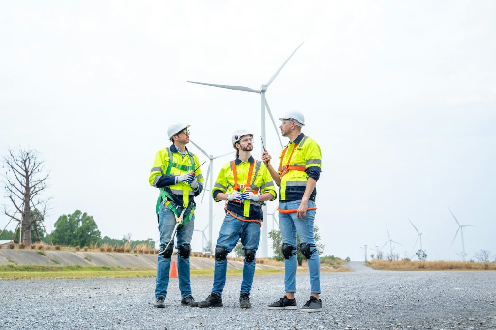 Engineer working at renewable energy farm.